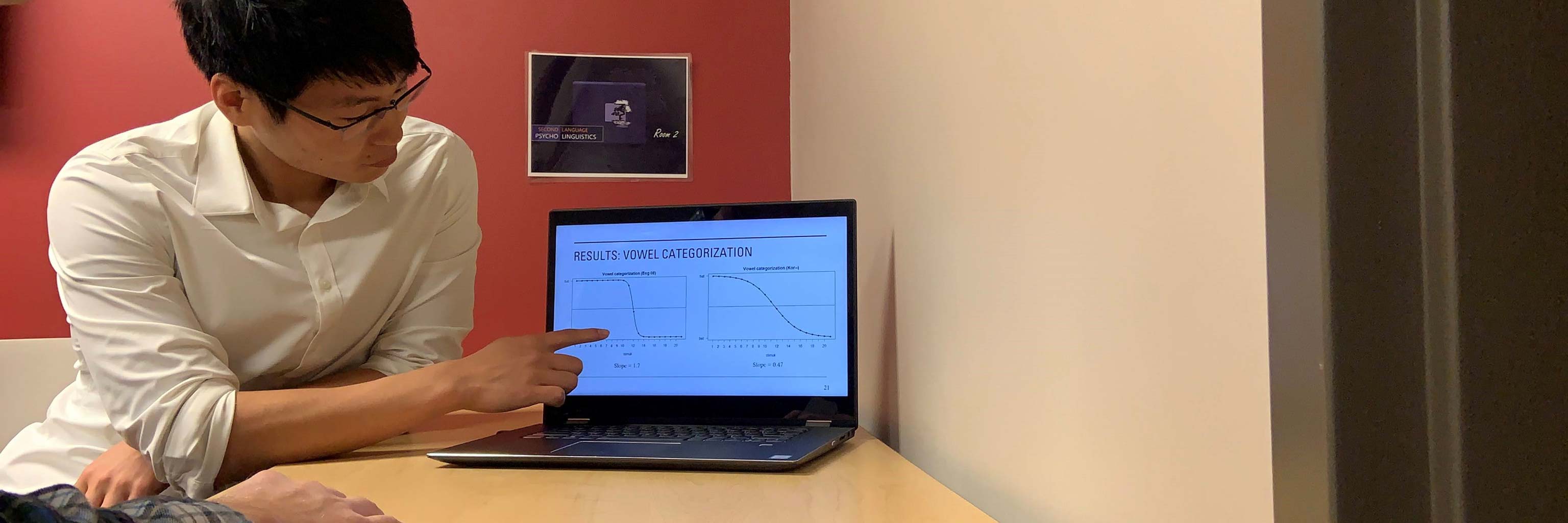 Student pointing at something on their computer